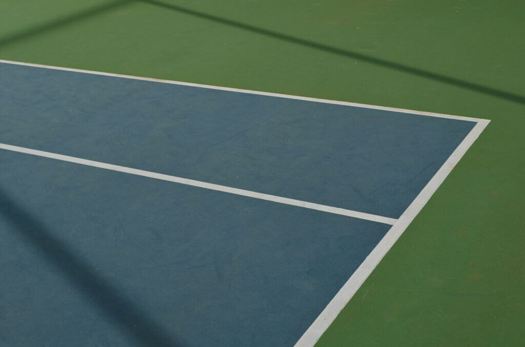 green and blue tennis court surface